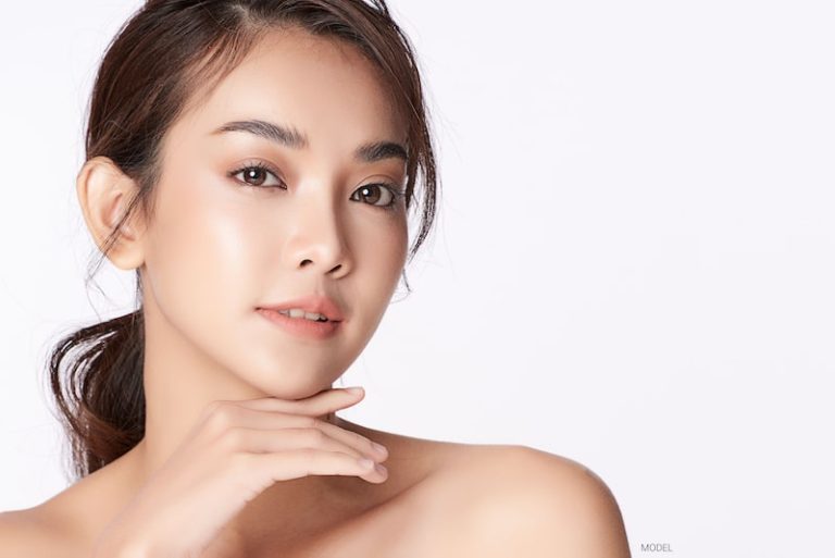 A young, pretty Asian woman.